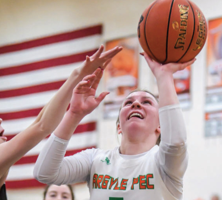 Loretta Tisch puts up a shot inside.