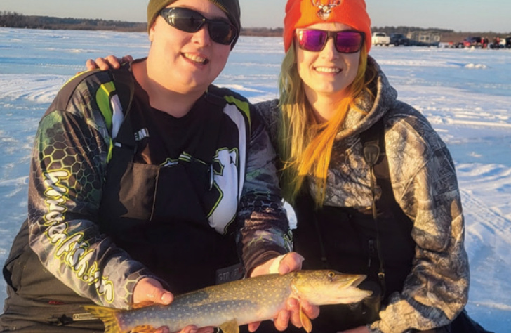 Left to Right: Emmy Geister and Alexa Messmer are good friends and hard- core fisherwomen.