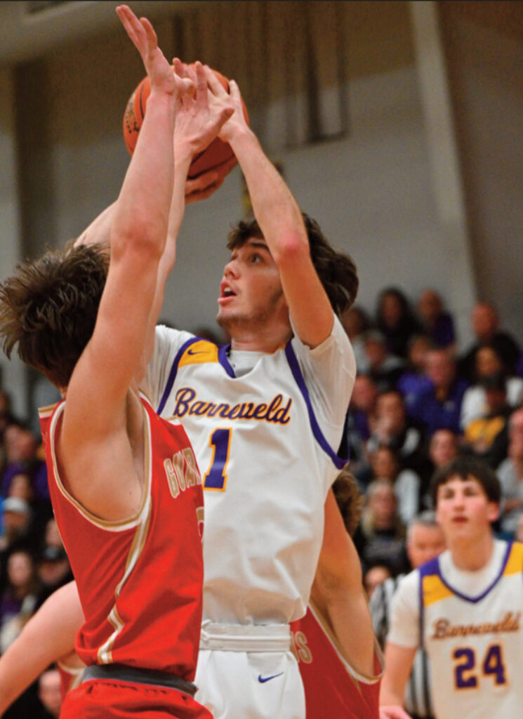 Eagle Cooper Shipman puts up a contested shot inside. Photo by Aninta Schmid.