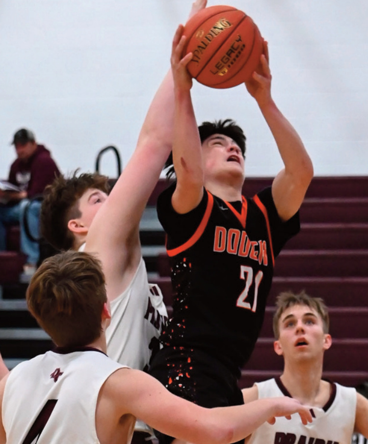 Dodger Jayce Halverson got inside for this rebound. Photo by Heather Olson.