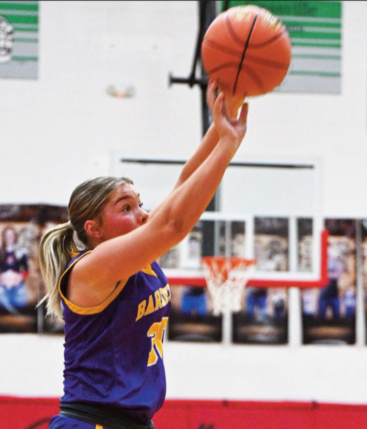 Aleea Norton launches a 3-pointer. Anita Schmid photo.