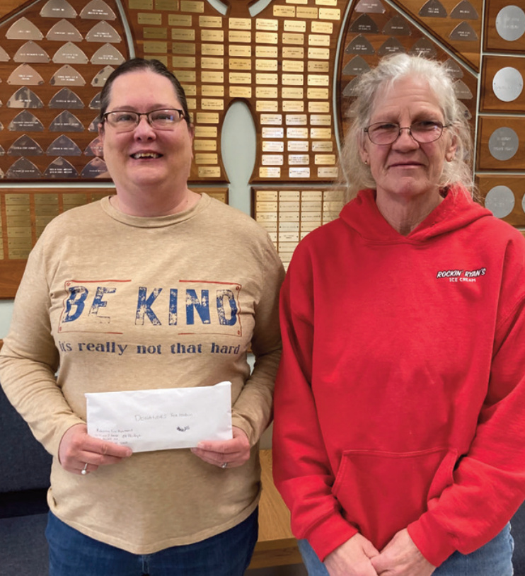 Marie (right) is pictured with Jamie Potterton-Yates, Hodan Center representa- tive.