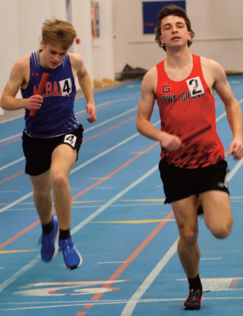 Noah Lange - finish of 4x400 M relay for 3rd place. Photo by David Friesen.