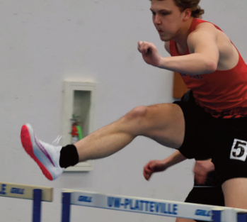 Braden Dowell finished 4th 55 M Hur- dles. Photo by David Friesen.