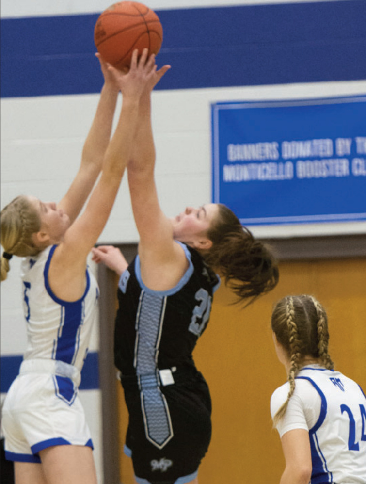 Pointer Maddy Kabat and A/M's Emerson Butts battle for the ball. Looking on is A/M's Molly Olson. Robin Wiegman photo.