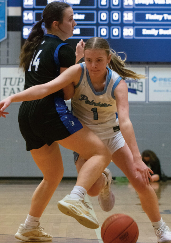 Jadyn Schultz drives around a Cambridge defender. Robin Wiegman photo.