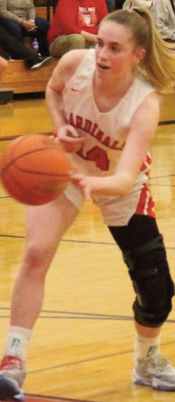 Cardinal Addison Beward looks to pass under the bucket.