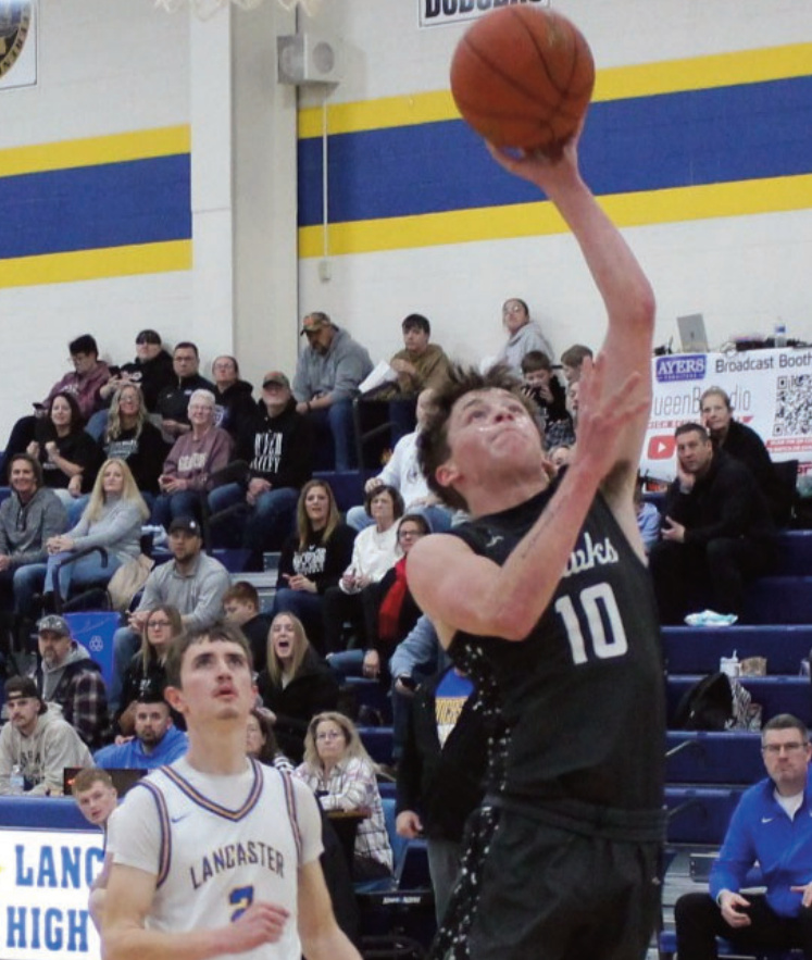 River Valley Senior Sumner Nachreiner makes this layup attempt in Thursday's victory at Lancaster. John Dalton photo.