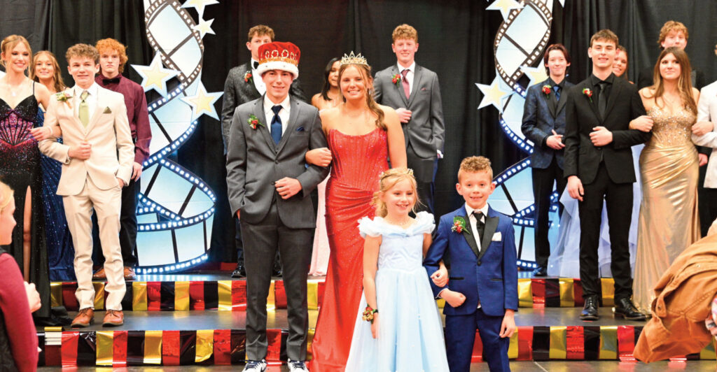 Prom 2026 was celebrated at Barneveld Schools Saturday night, April 18 with the annual dance and court presentation. Above are King Kaydn Schlimgen and Queen Jayda Oimoen with miniature King Beau Alfred and Queen Regan Reynolds with some of the other class members behind them. Anita Schmid photo.