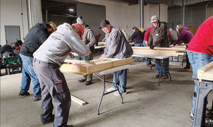 People cutting the boards