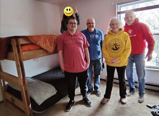 A family with one of the built beds
