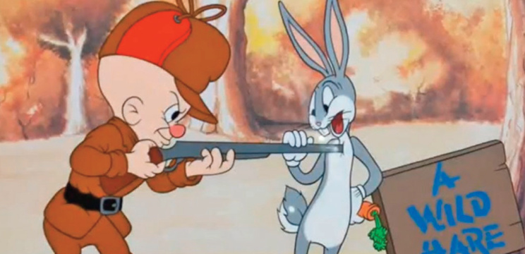 A picture from the cartoon Looney Toons with Elmer Fudd and Buggs Bunny