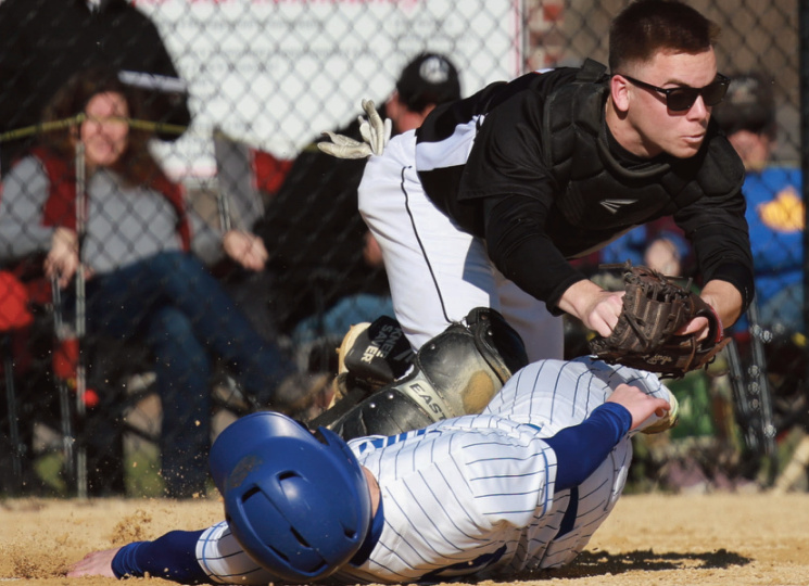 Iowa-Grant catcher Will Fulton tags out Mineral Point's Grady Finley at home plate Friday. Photo by John Dalton.