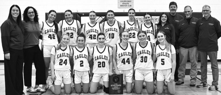 This season's Barneveld Girls Basketball Team made it all the way to the Division 5 State Tournament. Team members with the Sectional Plaque are (I-r) kneeling: McKenna Hopfensperger, Eliza Gordon, Hannah Esch, Izzy Durst, Aleea Norton and Erin Lasse; standing: Coaches Inger Alfred and Stacie Kasten. Nora Burris, Jayda Oimoen, Sophie Reese, Mya Norton, Madelynn Ignatius, Kenzie Danz, Rowan Valcheff and Coaches Dan Doescher, Bill Arneson and Jim Myers. Photo by Anita Schmid.
