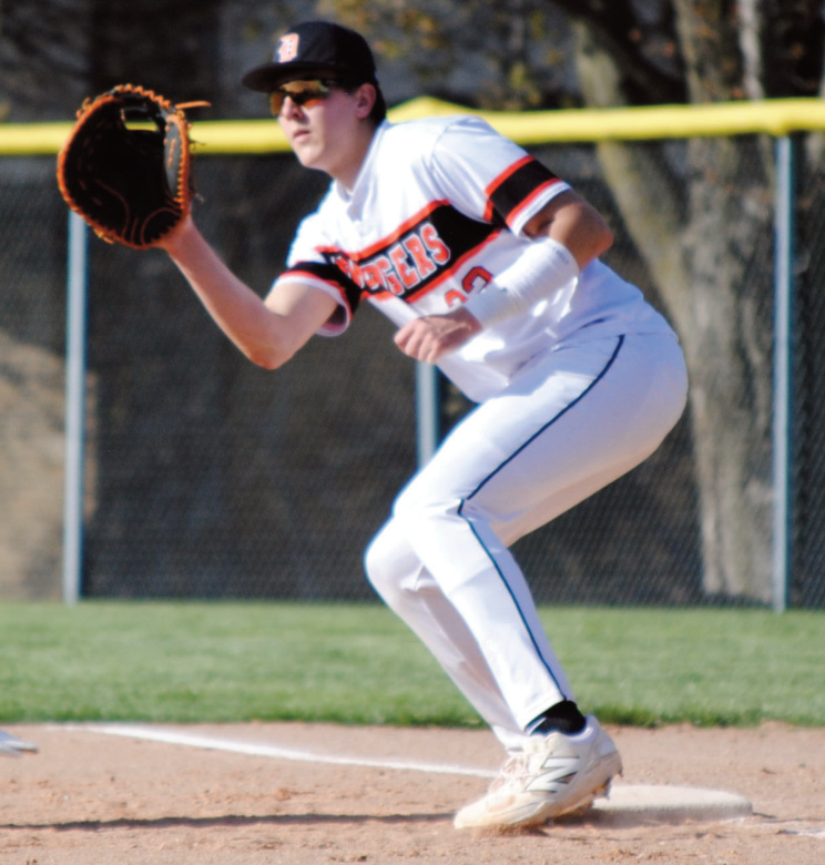When Caden Schneider isn't pitching, he takes throws at first base where he's very prolific. Photo byTommi Crubaugh.