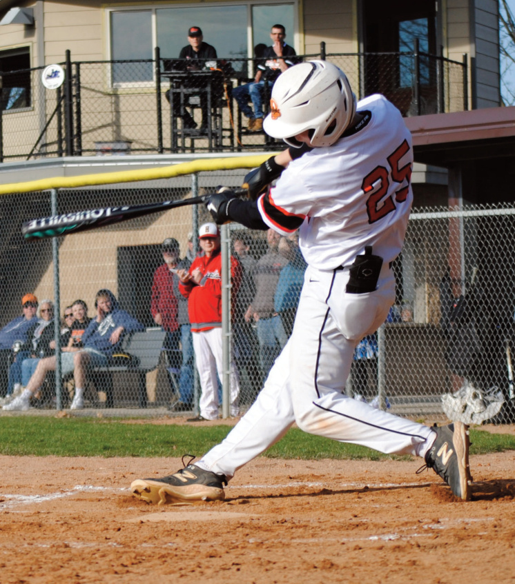 Dodger Jack Graber connects with a pitch. Photo by Tommie Crubaugh.