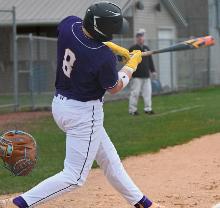 Ayden Knight raps one down the left field line. Anita Schmid photo.