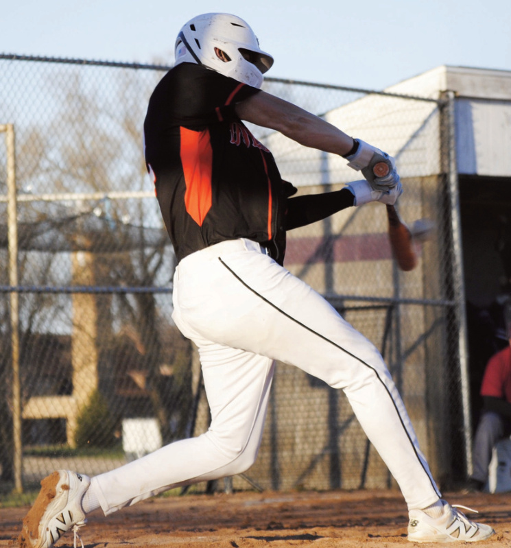 Dodger Caden Schneider connects. Photo by Tommi Crubaugh.