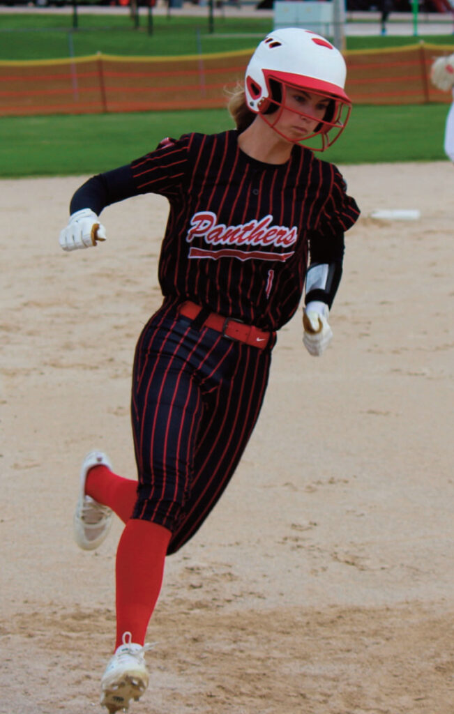 Panther Ava Klaas rounds third to score a run in Tuesday's contest against Fen- nimore.