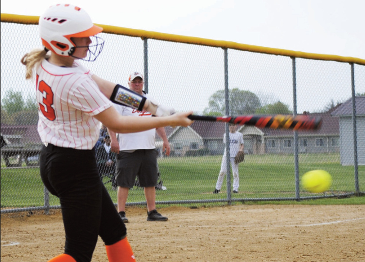 Tia Crubaugh raps a grounder. Tommi Crubaugh photo.