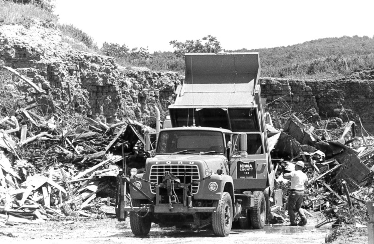 The quarry on the east side of the village became a dumping ground for the homes and businesses that were destroyed in the tornado. The ever-growing pile was eventually burned.