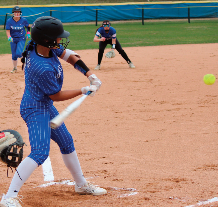 Pointer Chloe McVay steps into this this pitch against Southwestern. Photo by John Dalton.