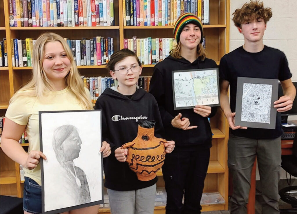 Students with their art work