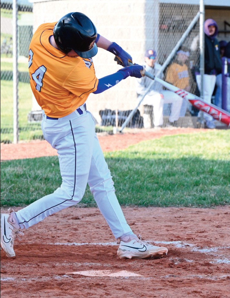 Karson Leuzinger connects on a pitch. Anita Schmid photo.