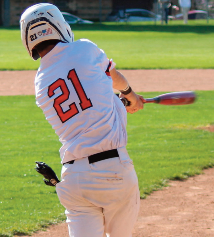 Jayce Halverson raps out a hit. Photo by John Dalton.