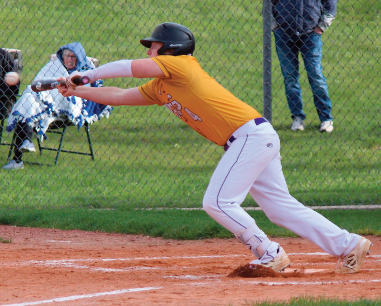 Eagle Karsen Leuzinger attempts a bunt. John Dalton photo.