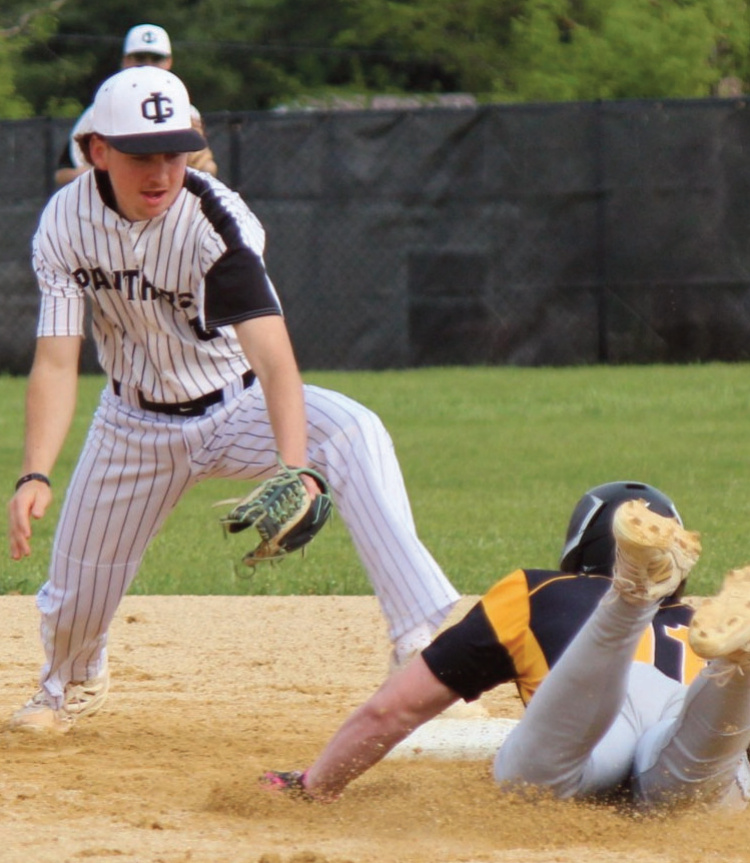 Panther shortstop Maddox Fisher tags out a Cuba City runner at second base on Monday night action. Photo by John Dalton.