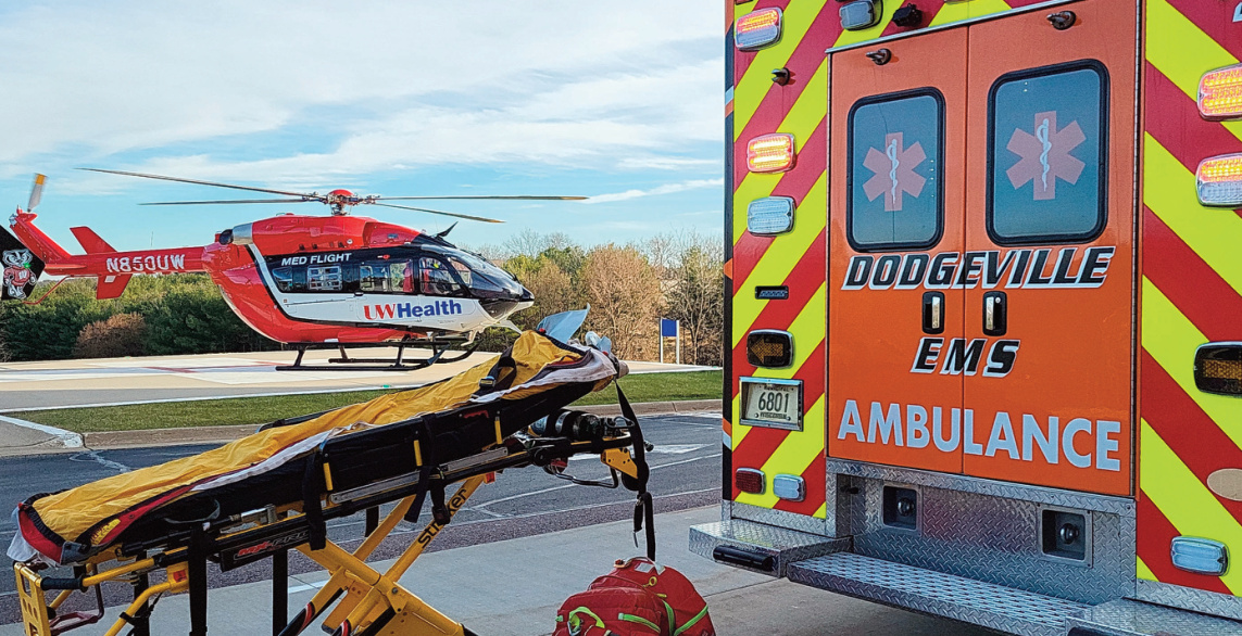 Picture of a helicopter and ambulance