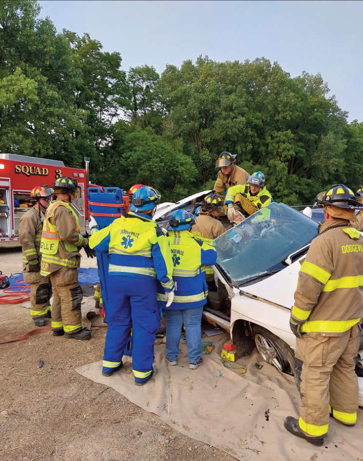 Fire department and EMS at a car accident