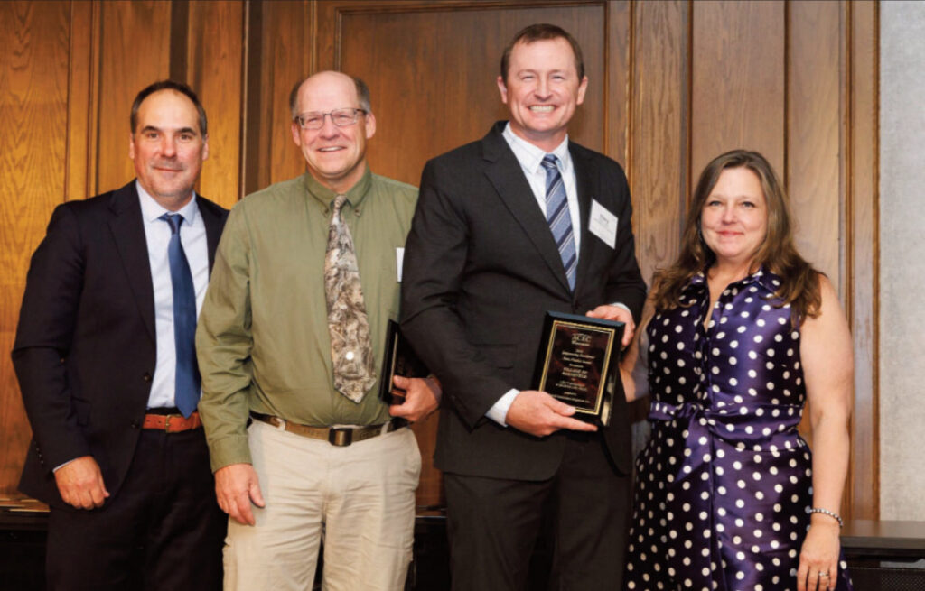Pictured left to right: Chris Klein - Executive Director ACEC, Craig Hardy - Iowa County Highway Commissioner, Ellery Schaffer - President Jewell and Associates and Tonia Westphall - Chair ACEC.
