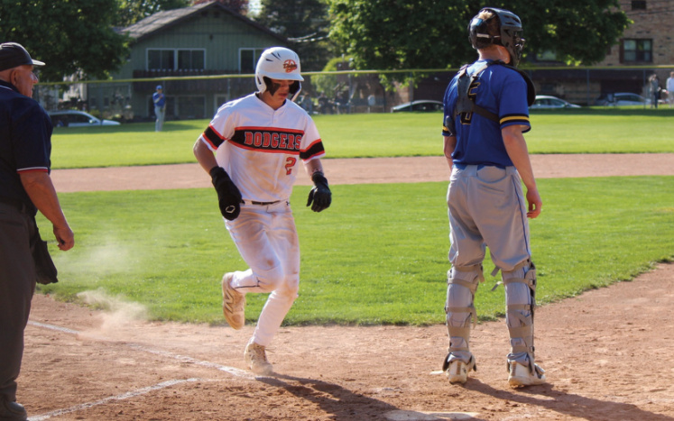Bryce Cubuagh-Lockard scores a run. John Dalton photo.