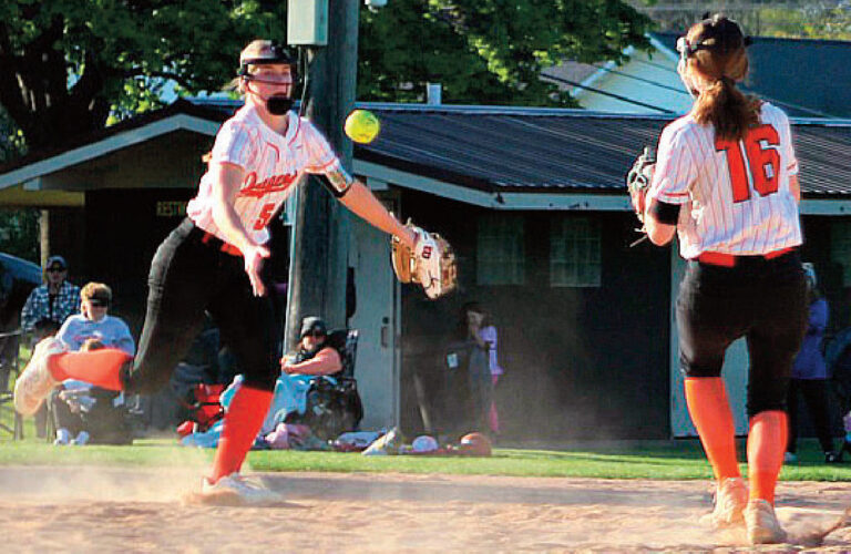Shortstop Emma Dougherty tosses to second sacker Brienna Wasley for a force out. Photo by Angie Borne.