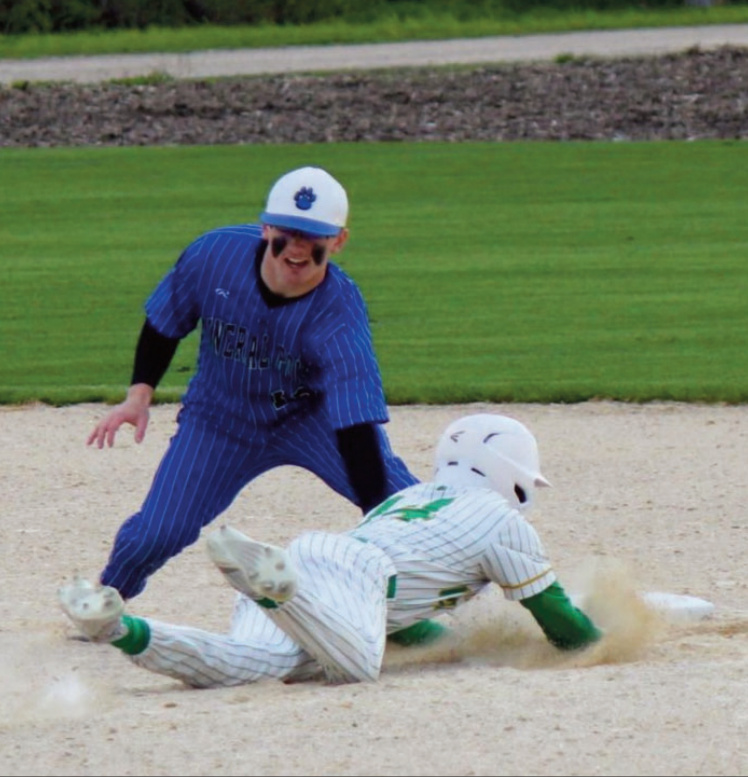 Pecatonica's Kale Hendrickson slides safely under Grady Finley's tag at second base.