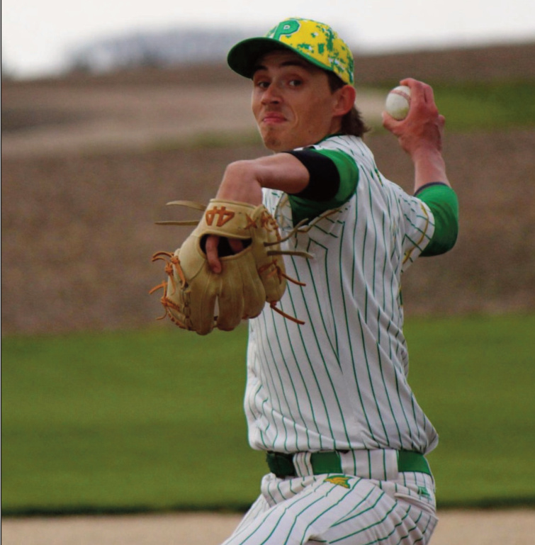 Pecatonica pitcher Austin Enloe about to deliver a pitch Thursday at Field of Dreams.
