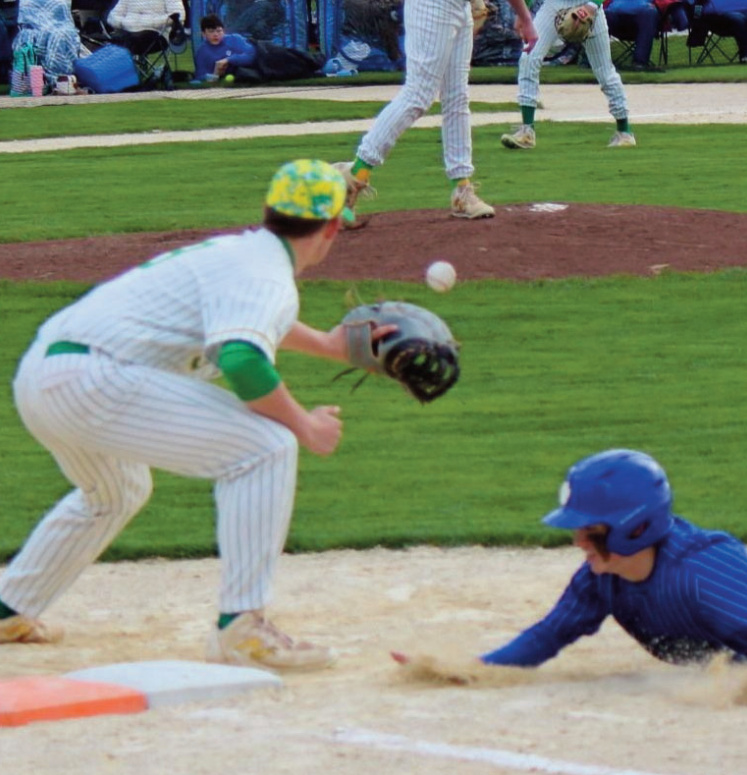 Pointer Connor Rolli barely escapes this pick-off attempt by Pecatonica pitcher Austin Enloe.