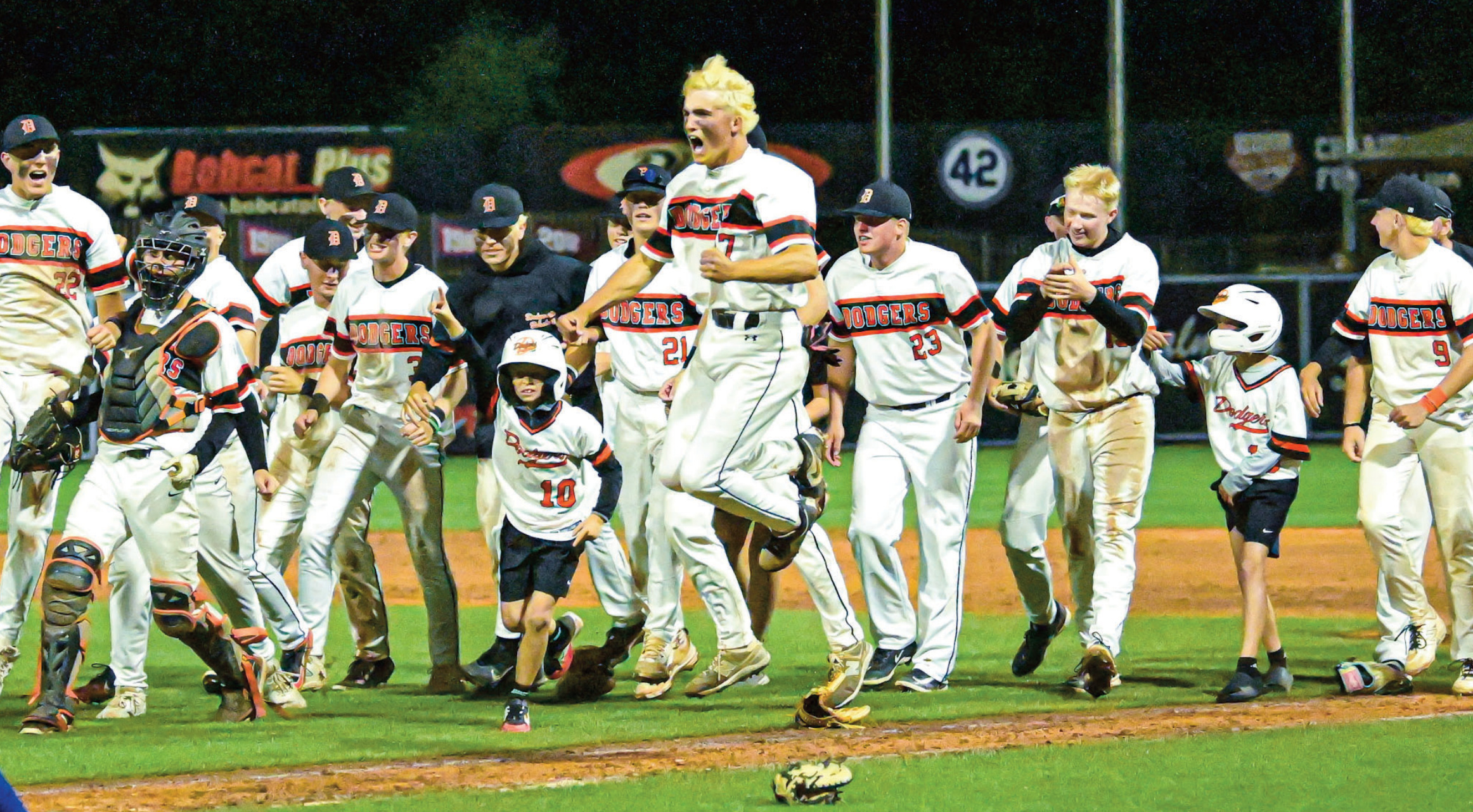Dodgeville baseball team celebrates after beating the number one seeded St. Croix Falls.