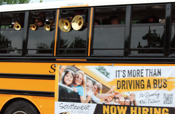 Marching band playing inside of school bus