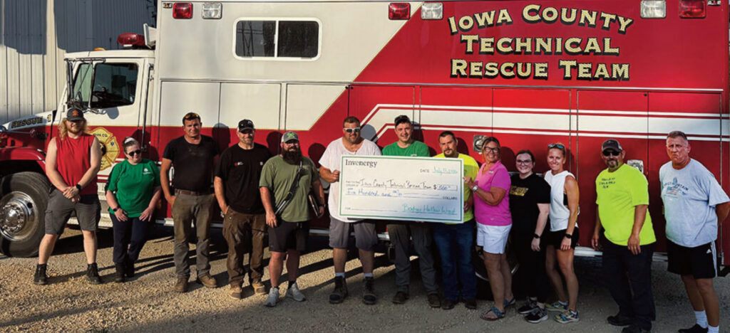 Iowa County First Responders holding a check