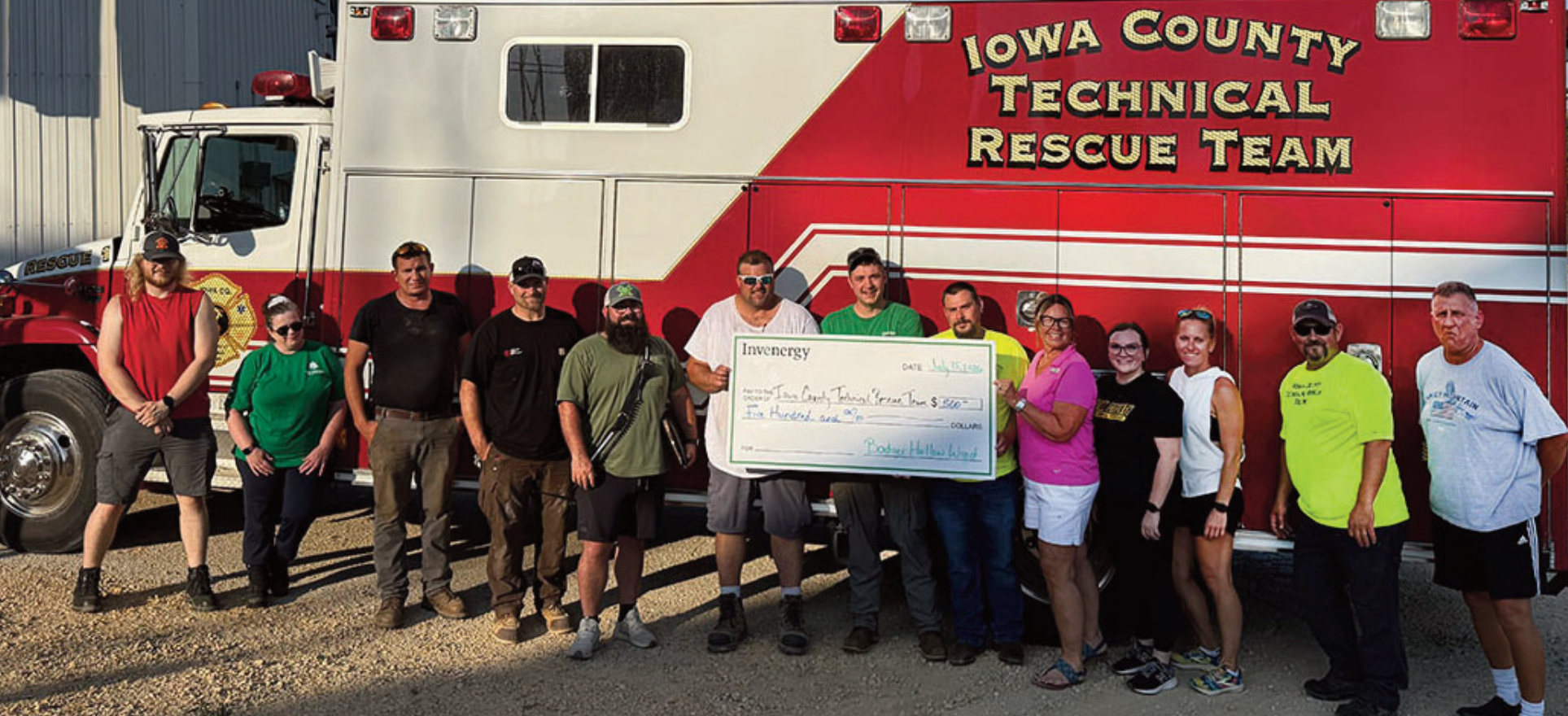 Iowa County First Responders holding a check