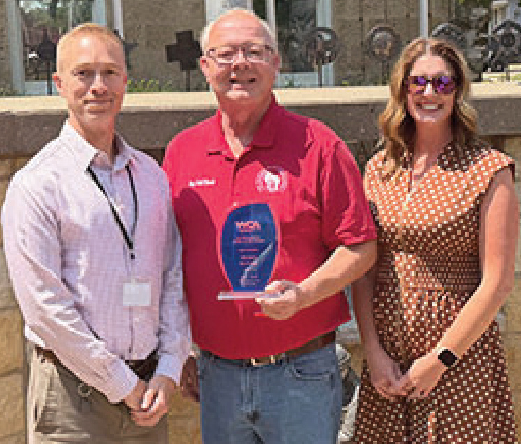 Todd Novak with a WCA Outstanding Legislator Award