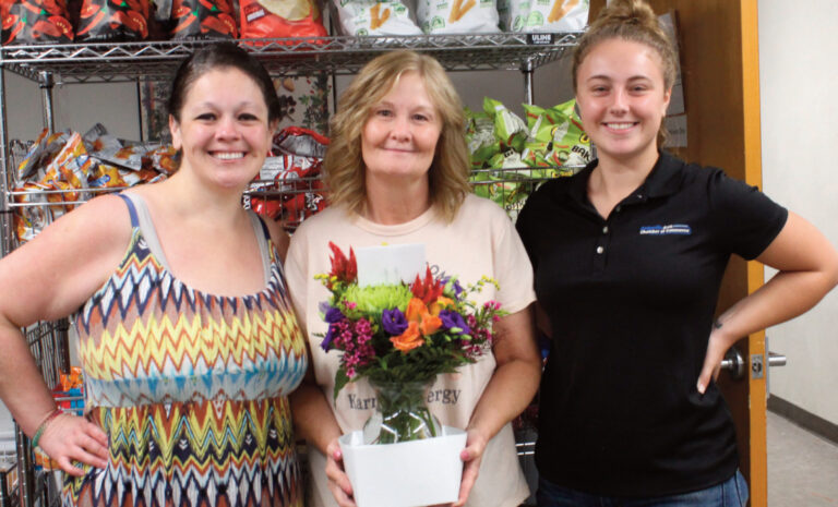 Ashley, Rohnda and Hanna with bouquet of flowers