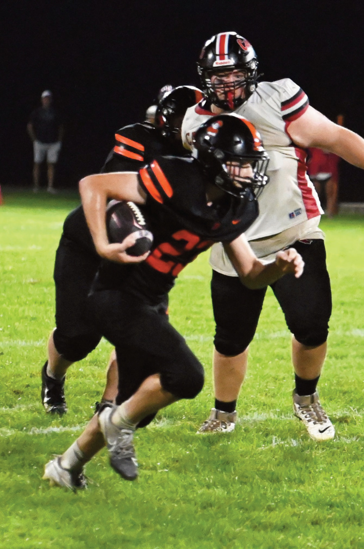 Dodgers Sawyer Miller finds some good running room. Photo by Heather Olson.