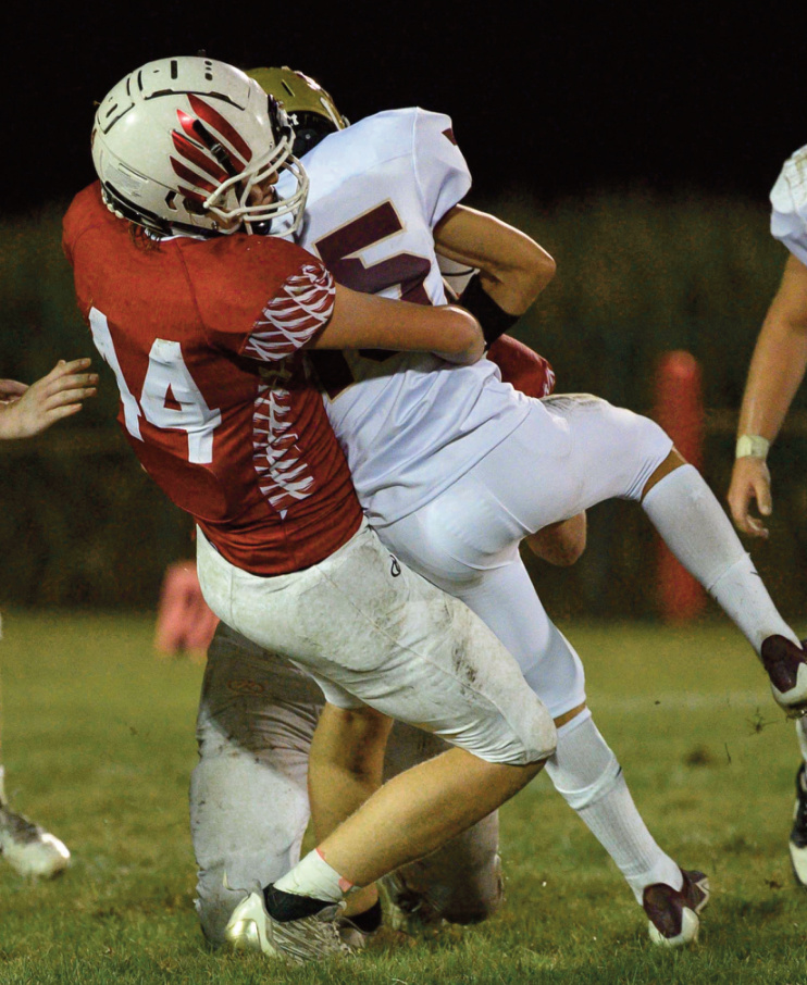 TJ Cool brings down a P/C running back. Jonelle Degenhardt photo.