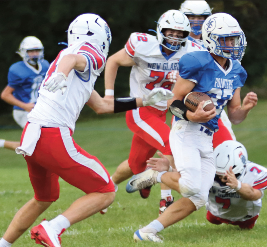 Pointer Mason Scullion finds an opening and tries to elude a tackle. Photo by Cambrey Carey.