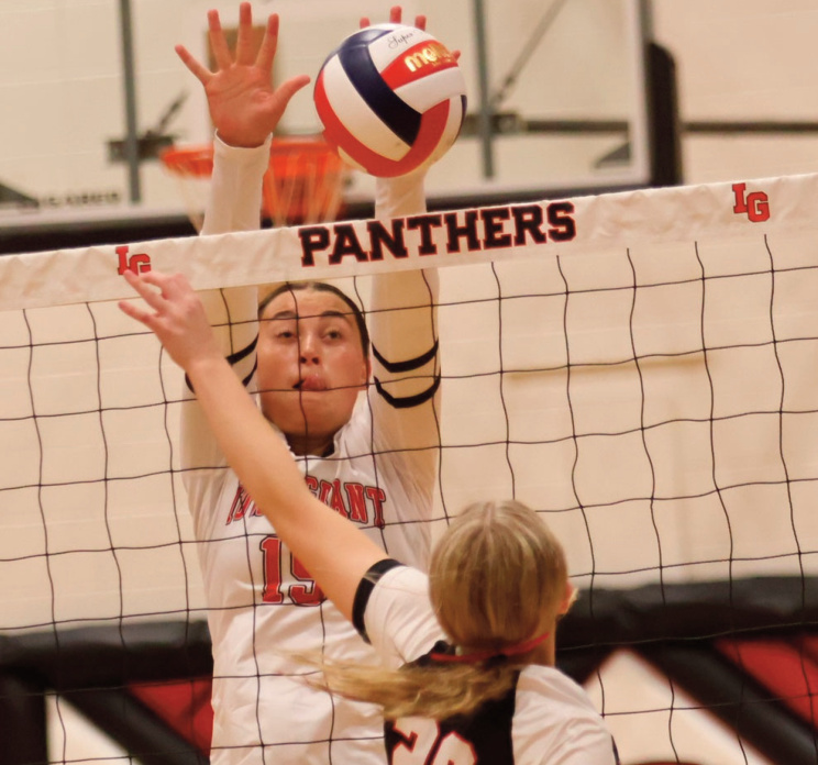 IG's Charley Draude goes up for a block. Dave Frfiesen photo.