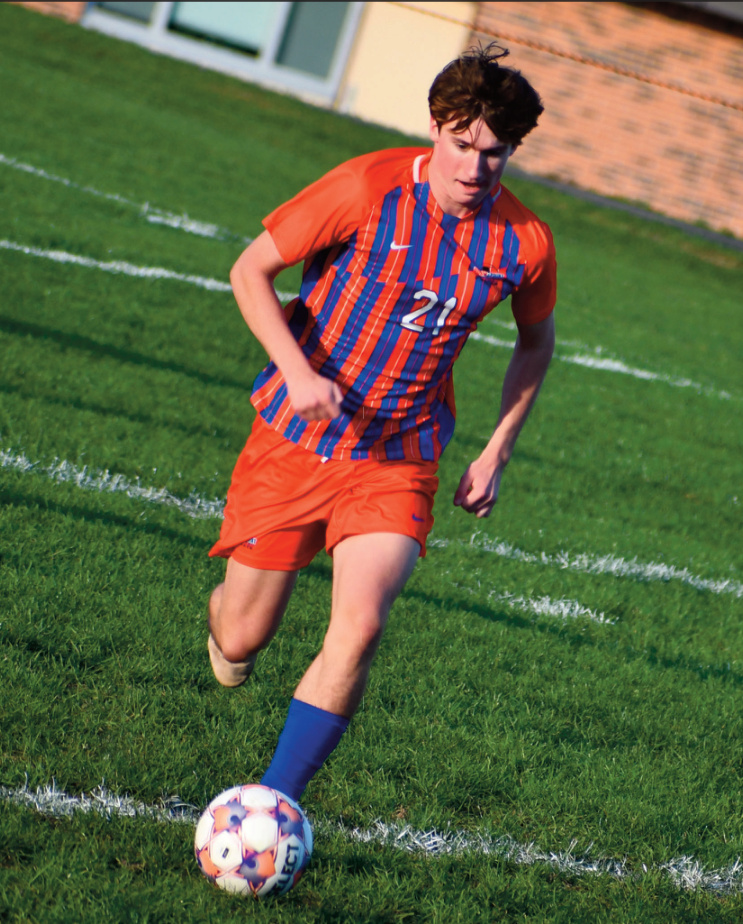 Eli Brokopp pushes the ball down the field.